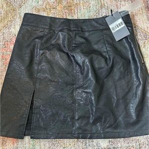 Black leather mini skirt